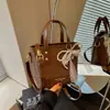 Bolsa Pequena Transversal Estilo Coreano Feminina Chegada Nova Verão 2026 Bolsa de Mão de Nicho Cor Personalizada Bloqueio de Cores Bolsa de Balde Simples