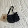 Bolso de Mezclilla Lavada Color Sólido Casual Sencillo Retro para Viajes Cotidianos 2026 Nuevo Moderno Bolso de Hombro Cruzado con Textura
