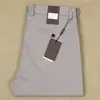 Pantalones Casuales Sueltos de Pierna Recta con Pinzas Sencillas para Hombre, Estilo Delgado de Primavera y Verano, Pantalones de Algodón Peinado Elástico para Hombre, Pantalones Largos Versátiles para Viajes de Negocios