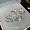 Pendientes Saturno de Plata Chapada en Oro Real de 18 Quilates con Aguja de Plata, Circonita y Perla Pendientes Retro Europeos y Americanos Lujo Accesible Pendientes de Alta Gama para Mujer