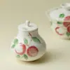 Rinno Gui Song Cerámica Porcelana Transparente Esmalte Bajo Pastel Lichi Mini Recipiente para Té Sellado Creativo de Alto Valor Recipiente a Prueba de Humedad