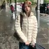 Chaqueta de algodón plumón para mujer, nueva de invierno, ligera, con capucha, chaqueta pequeña acolchada de algodón, estilo coreano, holgada, a la moda, cálida, abrigo de algodón