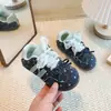Outono 2026 Novos Sapatos Casuais Infantis Versão Coreana Laço Doce Bolinhas Solado Macio Sapatos de Treino Alemães para Meninas