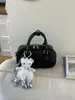 Bolso Retro de Bolos Yuezi 2026 Primavera Nuevo Bolso de Mano de Moda Texturizado Color Sólido Bolso Cruzado
