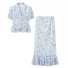 Ins estilo europeo y americano 2026 nueva moda temperamento ropa de mujer al por mayor viaje diario camisa estampada traje de falda corta