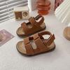 Sandalias de playa coreanas para niños 2025 verano nuevos zapatos de niña al por mayor antideslizantes zapatos para niños y estudiantes zapatos de comercio exterior zapatos de niño