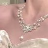 [Princesa del Atardecer] Collar de Gota de Agua Lujo Accesible Diseño de Nicho Incrustado con Pedrería Doble Capa Apilada Cadena de Clavícula con Borla