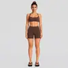 Conjunto de roupa fitness transfronteiriço, com um design traseiro estiloso, um top esportivo de gola halter e calças de yoga de secagem rápida, adequado para corrida ao ar livre, ciclismo e Pilates.