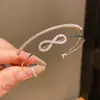 Pulsera abierta de doble capa redonda de circonita retorcida, sensación de lujo ligero y alta gama, versátil y moderna, joyería exquisita y elegante para mujer