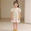 Fábrica de ropa infantil otoño nuevo producto elegante vestido floral de verano nuevo manga abullonada vestido de princesa MDD 2026 para niñas