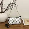 Bolso de moda de un solo hombro, estilo nuevo 2026, bolso de lunares simple de moda, bolso cruzado, bolso cuadrado pequeño simple de verano para el trabajo