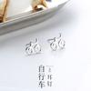Pendientes de bicicleta para mujer, lindos pendientes de bicicleta, Divertidos para niños, Versión coreana de accesorios de diseño de nicho, Venta al por mayor de productos de Yiwu