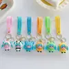 Llavero Colgante de Niña Linda de Dibujos Animados Sombreros de Pareja Hatsune Muñeca Brillante Llavero Colgante para Coche Regalo
