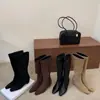 Botas pretas de cano alto estilo europeu e americano para mulheres, nova coleção de outono 2026, com um salto oculto de 5 cm, bico quadrado e efeito emagrecedor