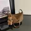 Bolsa transversal de design único, bolsa pequena minimalista para mulheres, nova coleção 2026, textura de alta qualidade, bolsa estilo bolinho para o dia a dia, bolsa transversal feminina