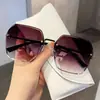 Gafas de Sol para Mujer 2025 Nuevas de Moda Tendencia para Rostro Grande Adelgazantes Sentido de Alto Nivel Protección UV Gafas de Sol Sin Marco