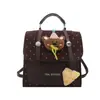 Tendencia transfronteriza bolso dulce cuadrado pequeño para mujer 226 Otoño nuevo bolso de hombro único con retazos de lunares mochila versátil