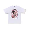 Comercio exterior al por mayor transfronterizo marca de tendencia estilo japonés camuflaje tiburón, cabeza de tigre, hombre-mono bloques de color luminoso manga corta corte holgado camiseta de pareja
