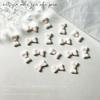 Nuevo mini lazo brillante para uñas, joyería luminosa de color, pequeño lazo, accesorios para uñas DIY.