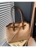 Bolso Tote Transfronterizo para Viajero Mujer Gran Capacidad 2025 Nuevo Primavera y Verano Simple Combinable Bolso de Hombro Bolso con Sensación de Alta Gama