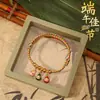 Cuerda Colorida Festiva Estilo Chino Dibujo Animado Infantil Tejida a Mano Cuerda Roja Bebé Nuevo Modelo 2026 Pulsera Pequeña de Zongzi Multicolor