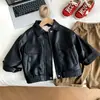Ropa exterior de primavera y otoño para niños, chaqueta de cuero para niños, nueva colección de otoño 2026, chaqueta de cuero informal estilo coreano para niños pequeños y mayores, versátil y moderna