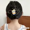 Um grampo de cabelo estiloso e versátil para mulheres, apresentando um design de bico de pato que não pressiona a parte de trás da cabeça, perfeito para criar penteados elegantes no outono e inverno.