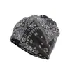 Gorra de invierno a prueba de viento con protección para los oídos, estampado de flor de anacardo, gorra tipo boina para hombre y mujer