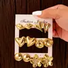 Joyería de Oreja de Venta Caliente Transfronteriza Europea y Americana Metal Geométrico Flor de Amor Set de Pendientes para Mujer Accesorios de Pendientes de Gama Alta