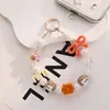 Nueva Cadena para Teléfono Móvil con Letras Pequeñas y Perlas, Llavero Colgante, Bolsos, Accesorios Pequeños, Regalos Pequeños, Venta al por Mayor