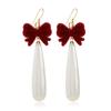 Europa y Estados Unidos tendencia caliente moda nicho diseño temperamento elegante dulce flor aretes colgantes largos de perlas