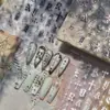 Tomoni Pegatinas para Uñas con Estampado en Caliente DIY Exquisitos Adornos para Uñas Europeos y Americanos Textura Metálica Material de Impresión Gótico