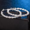 Moda simple y generosa aleación plateada joyería fabricantes suministro aretes redondos para damas exportación Europa y Estados Unidos más vendidos