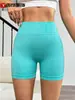 Pantalones cortos de yoga transfronterizos nuevos de cintura alta ajustados sin costuras realzadores de glúteos color durazno de tres cuartos para fitness deportivo al aire libre pantalones de yoga