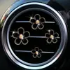 Pequeño crisantemo perfume para coche joyería aleación pequeña margarita flor de cinco pétalos flor clip decoración salida de aire del coche perfume