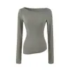 Conjunto de falda de longitud media, camiseta de manga larga ajustada y minimalista con cuello barco, suave y elástica, para mujer, capa base de primavera y otoño, que favorece la figura y se ajusta a la cadera