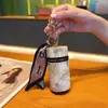 Bolsa de moedas criativa estilo nacional moda balde pequena transparente flor portátil fone de ouvido boca envelope vermelho chave do carro pingente