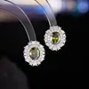 Pendientes de lujo y sofisticados con incrustaciones de gemas para mujer, joyería europea y americana transfronteriza, pendientes de diseño nicho para mujer al por mayor