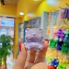 Llavero de Oso de corte geométrico de resina de dibujos animados para mujer, lindo y moderno, llavero de muñeca de perla, colgante para mochila escolar