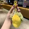 Suerte Colgante de Peluche de Caqui Llavero Adorno Caqui Suerte Colgante para Coche Adorno de Piel Sintética de Conejo Regalo