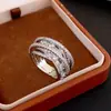 Anillo abierto de flor con letra de circonita ins sentido del diseño de nicho anillo de dedo de comida moda de lujo ligero nueva joyería al por mayor