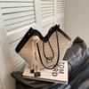 Bolsa de palha de alta capacidade Sense de alta qualidade para mulheres 2023, nova bolsa de ombro com textura da moda, cesta de vegetais, bolsa de viagem