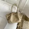 Bolso cubo versátil transfronterizo para mujer, nuevo y moderno de la versión coreana de principios de otoño, bolso de mano/hombro exquisito y elegante para el día a día