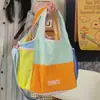 Bolsa tote com design de nicho, bolsa feminina casual com design de nicho, leve, color blocking, bolsa de mão personalizada para estudantes 2026 para mulheres
