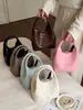 Bolsa de cubo de color liso simple casual de verano 2026 Bolso de mano elegante y moderno Bolso de mano de moda