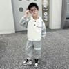 Terno com lapela para meninos 2023 Primavera e Outono novo conjunto de duas peças moderno e bonito para crianças vestuário infantil de comércio exterior moda