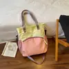 Bolsa Ita Estilosa para Estudantes com Costura Color Block 2026 Nova Dopamina Leve Casual Grande Capacidade Ombro Único Transversal