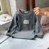 Ropa interior para niñas otoño ropa infantil coreana niñas niños mayores otoño color café con leche camiseta de manga larga top versátil para niños