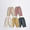 Pantalones rectos holgados de color liso, unisex, estilo coreano moderno INS, pantalones largos de algodón de grado A para niños, primavera/otoño, pantalones zanahoria