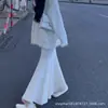 Saia Lápis Mermaid de Tricô Preta Feminina Outono 2026 Nova Cintura Alta Emagrecedora Petite Estilo Intelectual Madura